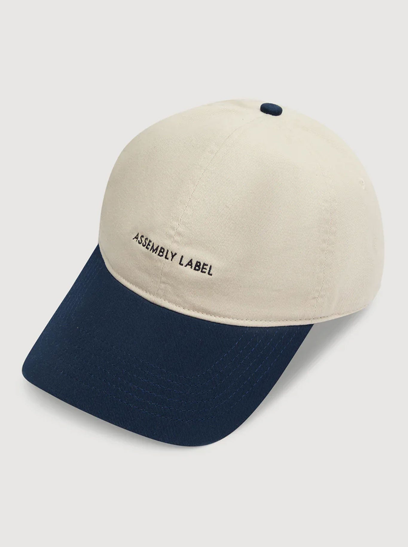 ASSEMBLY LABEL CONTRAST CAP