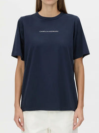 CAMILLA AND MARC SUVERO LOGO TEE