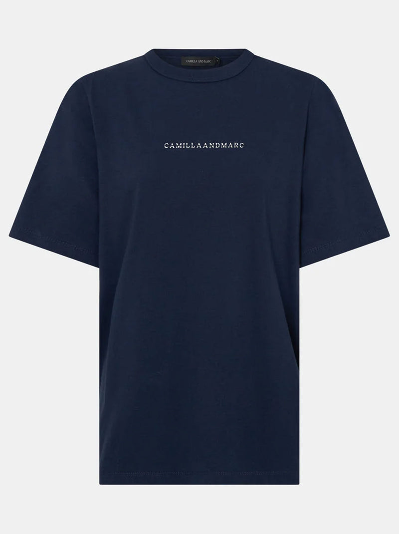 CAMILLA AND MARC SUVERO LOGO TEE