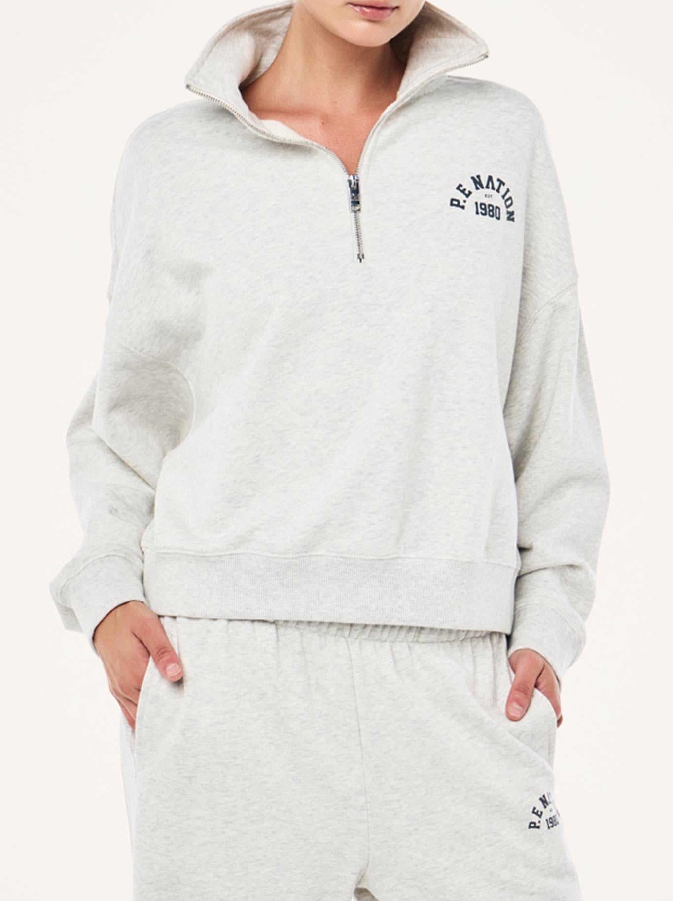 P.E NATION SWERVE ZIP NECK