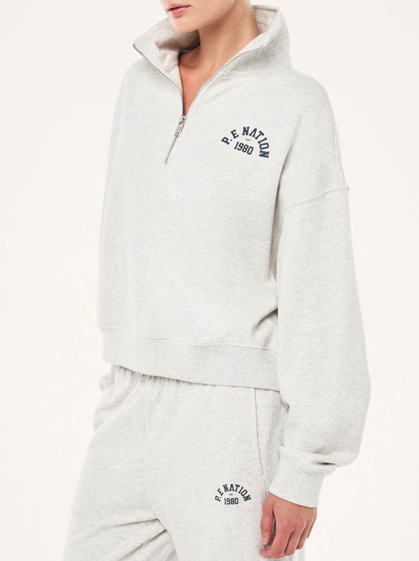 P.E NATION SWERVE ZIP NECK