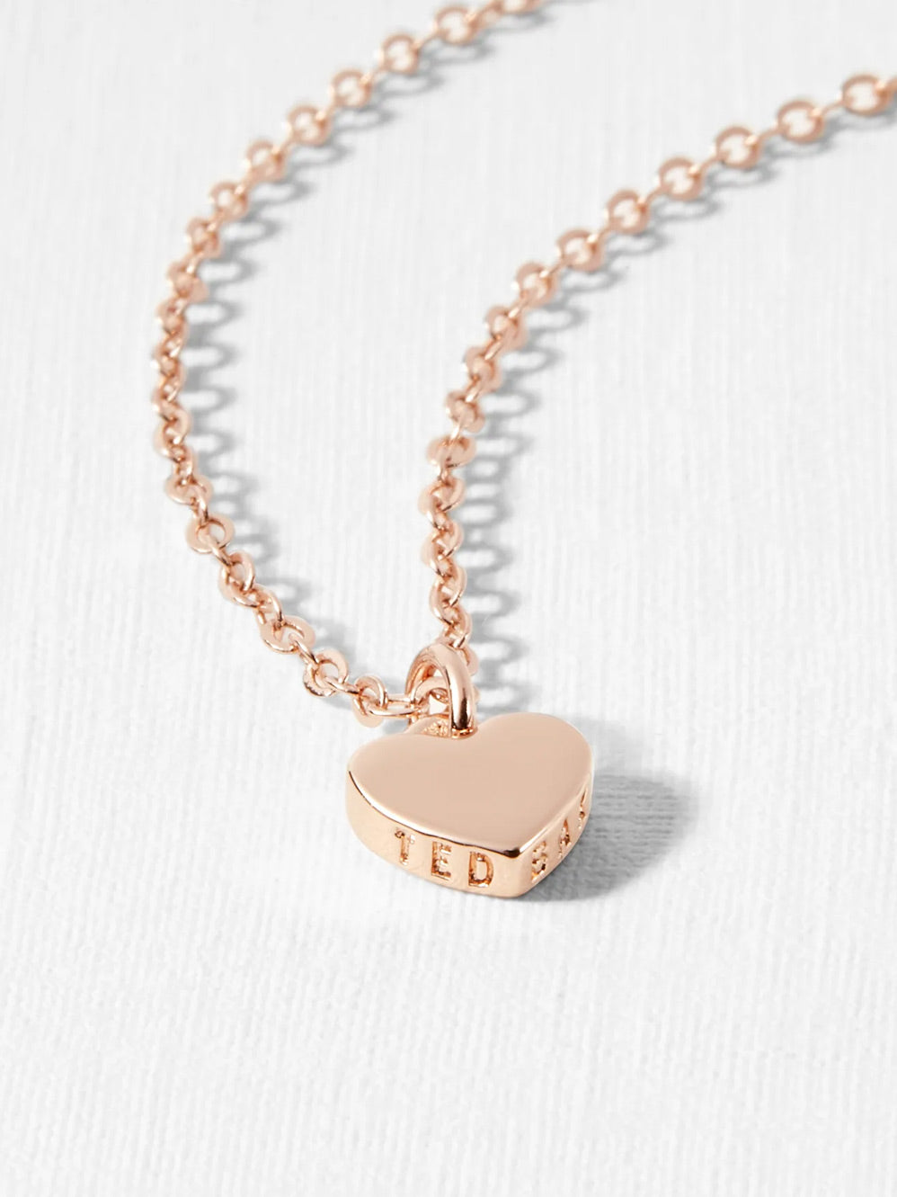 Ted Baker Hara tiny heart pendant necklace in silver | ASOS